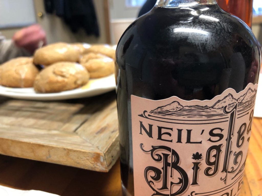 In Acme, Wash., a bottle of Neil's Bigleaf Maple Syrup and some maple scones await taste testers. The finished syrup mostly ends up in Seattle restaurants. CREDIT: Anna King/N3
