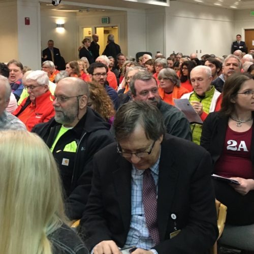 People packed a Washington legislative committee hearing room Monday, Jan. 20, to speak against and in favor of proposed gun safety measures. CREDIT: Austin Jenkins/N3