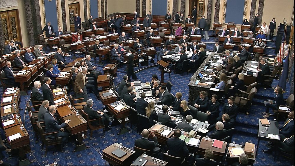 Senators cast their vote on the motion to allow additional witnesses and evidence to be allowed in the impeachment trial against President Donald Trump in the Senate at the U.S. Capitol in Washington, Friday, Jan. 31, 2020. The motion failed with a vote of 51-49. CREDIT: Senate Television via AP