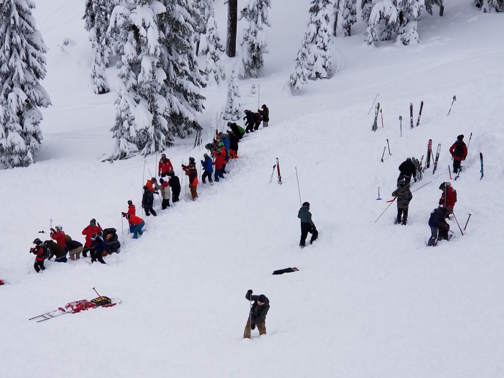 Search and rescue team members search for victims Tuesday, Jan. 7 at Silver Mountain Resort in Kellogg, Idaho. Courtesy of Hank Lunsford via Spokane Public Radio