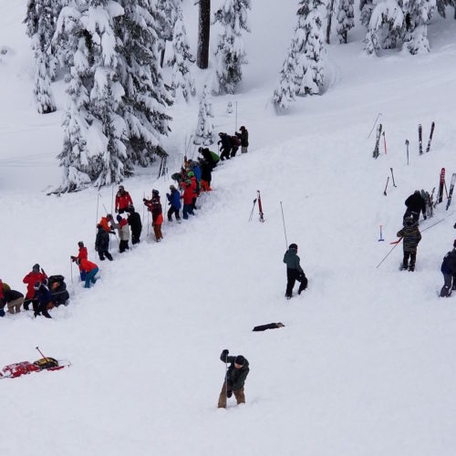 Search and rescue team members search for victims Tuesday, Jan. 7 at Silver Mountain Resort in Kellogg, Idaho. Courtesy of Hank Lunsford via Spokane Public Radio