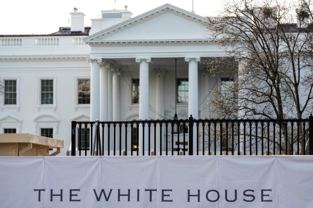 The new fence surrounding the White House is seen behind a screen in Washington, U.S., January 12, 2020. CREDIT: Joshua Roberts/Reuters