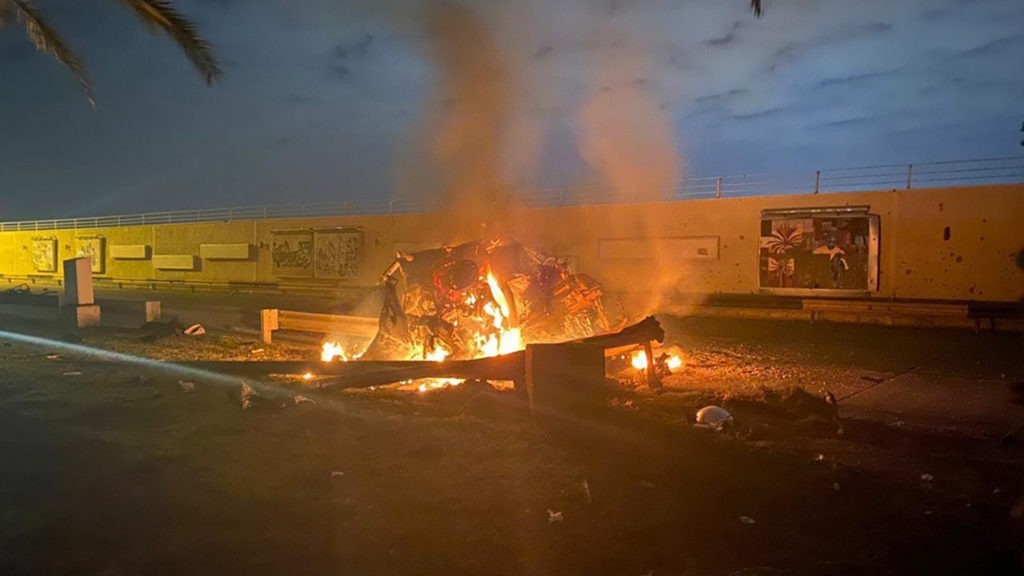 This photo released by the Iraqi Prime Minister Press Office shows a burning vehicle at the Baghdad International Airport following an airstrike in Baghdad, Iraq, Friday. The Pentagon said Thursday that the U.S. operation killed Gen. Qassim Soleimani, the head of Iran's elite Quds Force. AP