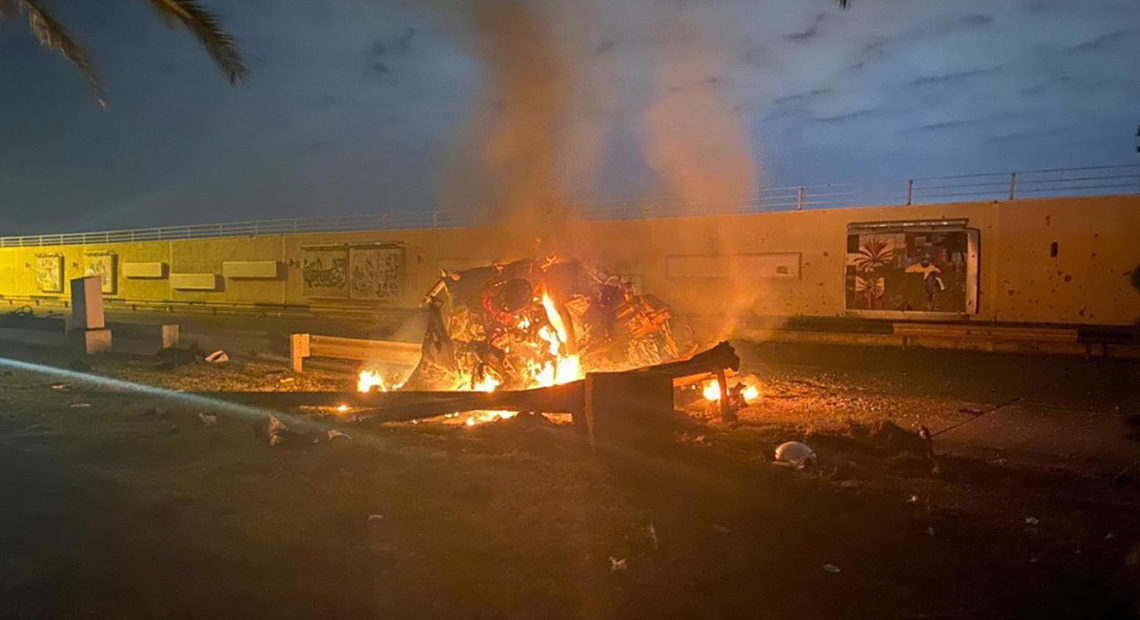 This photo released by the Iraqi Prime Minister Press Office shows a burning vehicle at the Baghdad International Airport following an airstrike in Baghdad, Iraq, Friday. The Pentagon said Thursday that the U.S. operation killed Gen. Qassim Soleimani, the head of Iran's elite Quds Force. AP