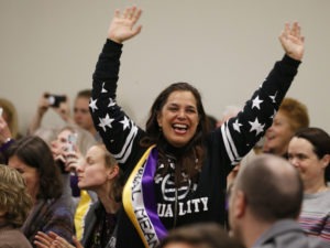 Both houses of Virginia's legislature voted to ratify the Equal Rights Amendment, but the ERA's future is uncertain: Its original deadline elapsed decades ago. Here, an ERA supporter reacts to a Virginia Senate committee's vote to advance the ERA amendment last week. CREDIT: Steve Helber/AP