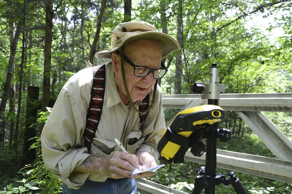 Bob Vollmer, seen in a 2016 photograph provided by the Indiana Department of Natural Resources, shows the now-102-year-old at work. The state's oldest employee plans to retire next month, after nearly six decades on the job. CREDIT: John Maxwell/Indiana Department of Natural Resources via AP