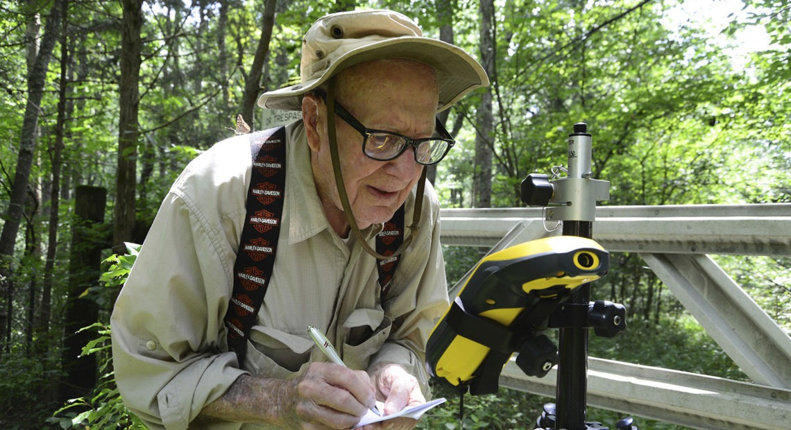 Bob Vollmer, seen in a 2016 photograph provided by the Indiana Department of Natural Resources, shows the now-102-year-old at work. The state's oldest employee plans to retire next month, after nearly six decades on the job. CREDIT: John Maxwell/Indiana Department of Natural Resources via AP