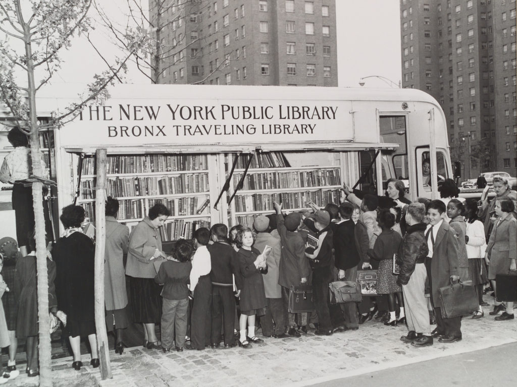 Children in the Bronx visit a New York Public Library bookmobile in the 1950s. CREDIT: The New York Public Library