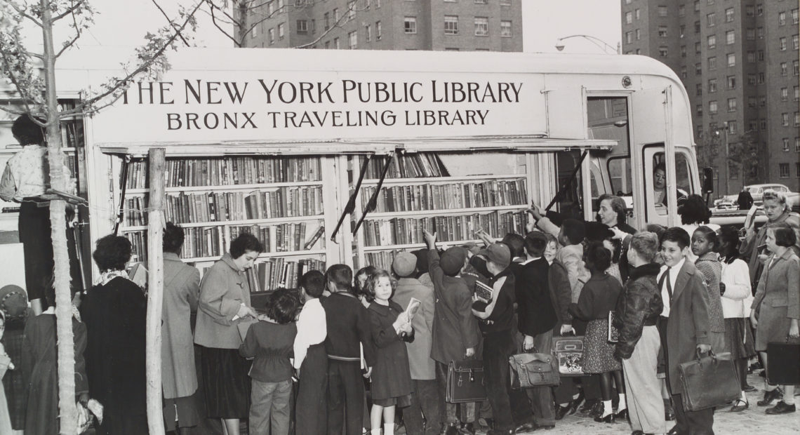 Children in the Bronx visit a New York Public Library bookmobile in the 1950s. CREDIT: The New York Public Library
