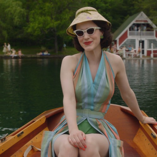 In the second season of The Marvelous Mrs. Maisel, Midge (Rachel Brosnahan) visits the Catskills. Costume designer Donna Zakowska says this outfit "in the boat with a funny lampshade hat" was among her favorites. CREDIT: Amazon Studios