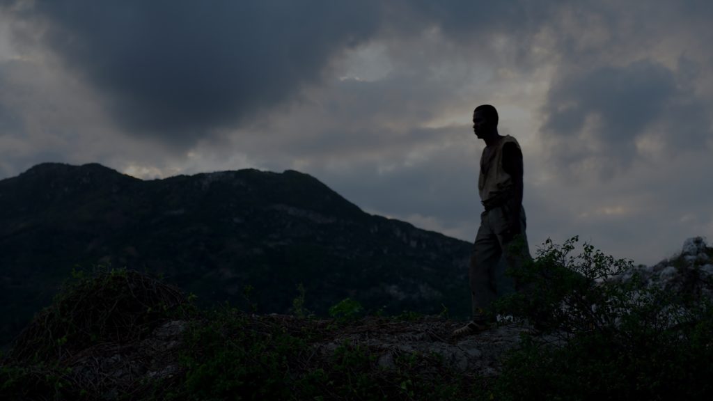 The story of a man (Mackenson Bijou) who was brought back from the dead casts a long shadow into the present in Zombi Child. CREDIT: Film Movement