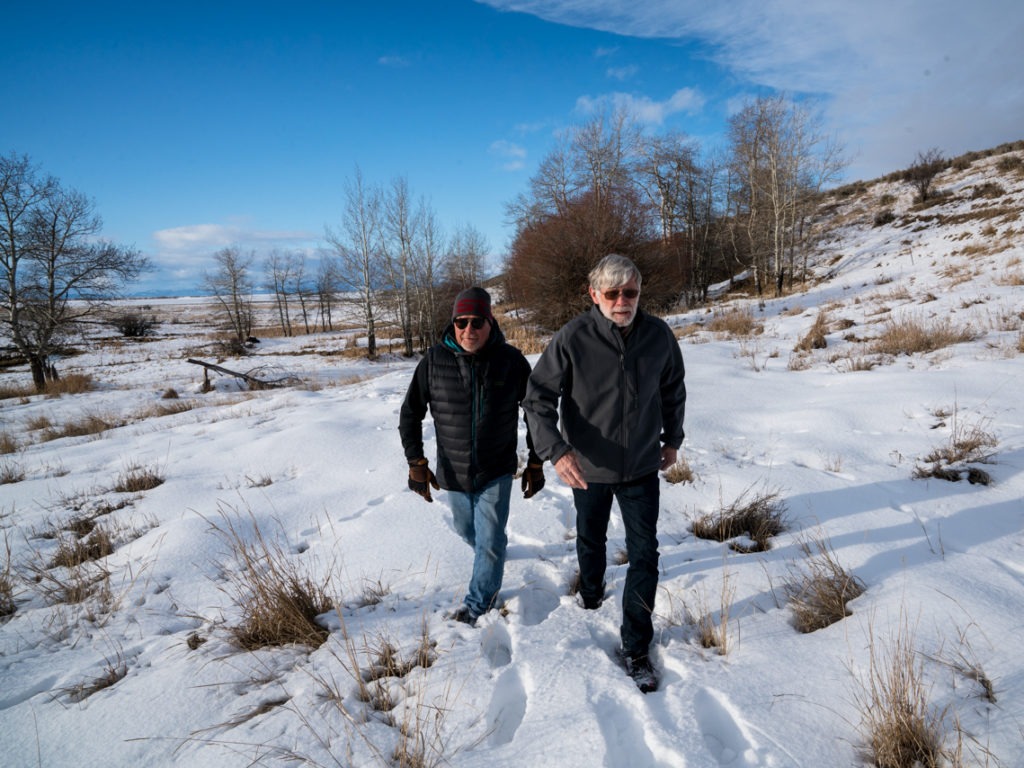 John Kowalski (left) and Paul Roos, retired hunting and fishing guides and conservationists, worked to secure the funding necessary to restore the wetlands surrounding Nevada Spring Creek through a private mitigation bank. CREDIT: Nick Mott/Montana Public Radio
