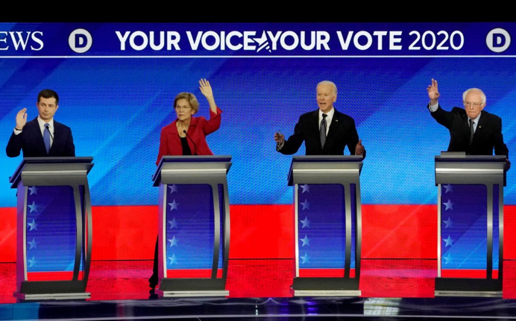 Democratic presidential candidates participate in the eighth 2020 debate at Saint Anselm College in Manchester, New Hampshire, on Feb. 7, 2020.