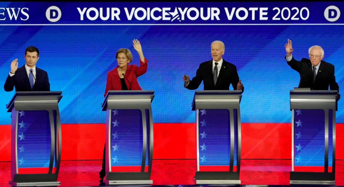 Democratic presidential candidates participate in the eighth 2020 debate at Saint Anselm College in Manchester, New Hampshire, on Feb. 7, 2020.