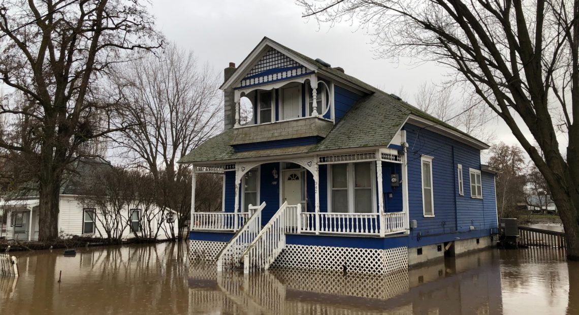 Many houses in Waitsburg, Washington, a small wheat town, are still sitting in lakes of trapped water. Residents were busy moving out their valuables, and accessing damage on Saturday, Feb. 8, 2020. CREDIT: Anna King/N3
