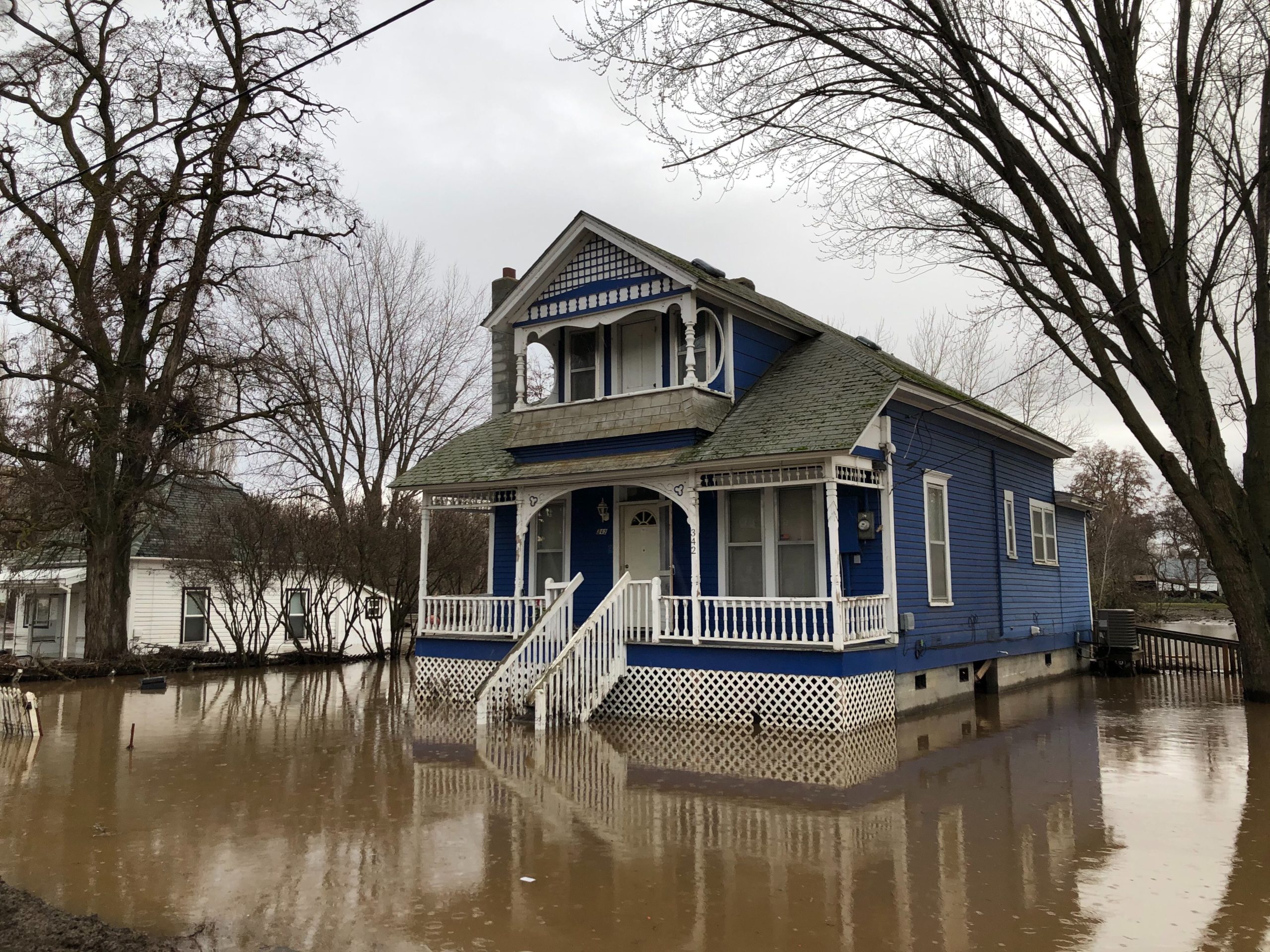 Many houses in Waitsburg, Washington, a small wheat town, are still sitting in lakes of trapped water. Residents were busy moving out their valuables, and accessing damage on Saturday, Feb. 8, 2020. CREDIT: Anna King/N3