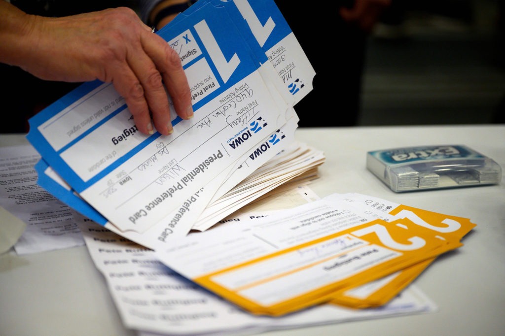 Votes are counted during caucusing in the 66th precinct at Abraham Lincoln High School in Des Moines, Iowa. Jim Watson/AFP/Getty Images