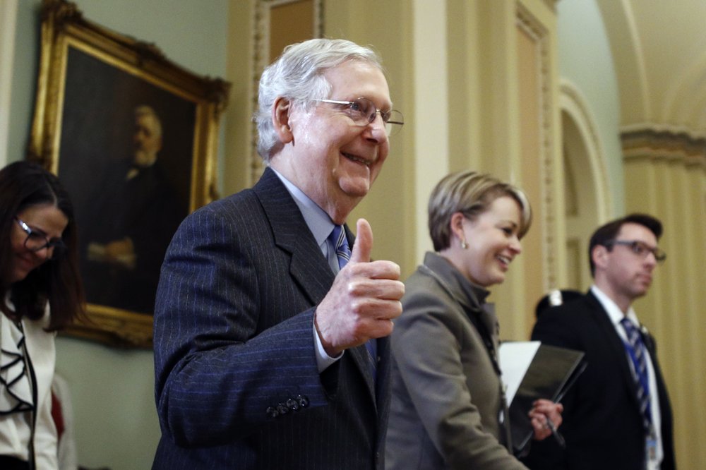 Senate Majority Leader Mitch McConnell, R-Ky., gives a thumbs-up as he leaves the Senate chamber during the impeachment trial of President Donald Trump at the Capitol, Jan. 31, 2020. CREDIT: Steve Helber/AP
