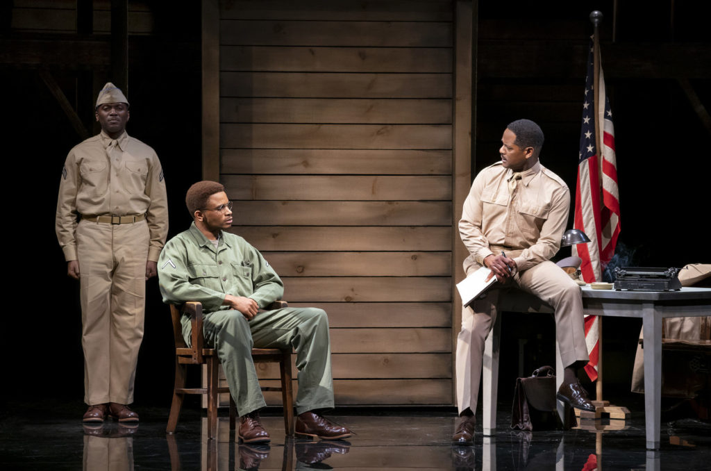 Nnamdi Asomugha (center) plays Private First-Class Melvin Peterson — a role performed by Denzel Washington in 1981 — in the Broadway revival of A Soldier's Play. Joan Marcus