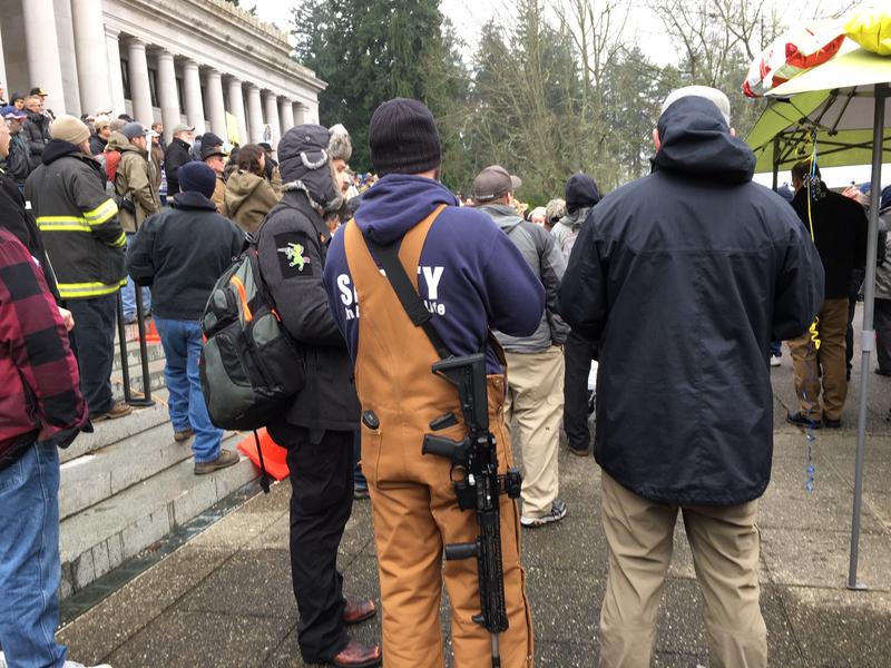 Under current Washington law, visitors to the Capitol can openly-carry firearms. A bill introduced in the Legislature would ban weapons from the statehouse and Capitol grounds. CREDIT: Austin Jenkins/N3
