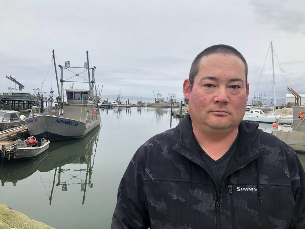 Kenichi Wiegardt is a fifth-generation oyster grower. He's worried he'll be the last in his family if the coronavirus doesn't get better and trade doesn't pick up to the Pacific Rim and China. Exports there make up the majority of his fresh oyster packing business. CREDIT: Anna King/N3