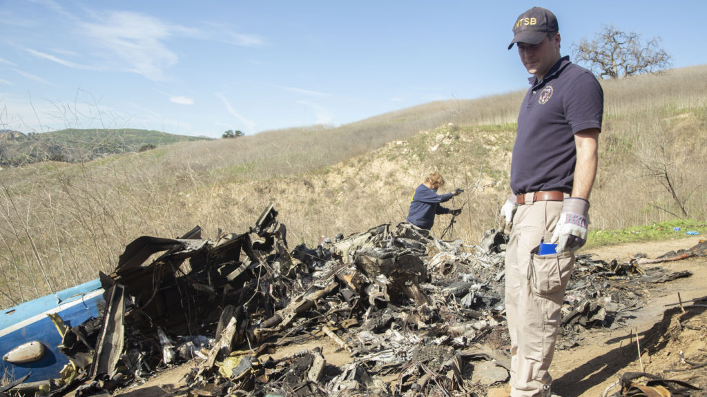 National Transportation Safety Board examine wreckage on Jan. 27 of the crash that killed NBA star Kobe Bryant and eight other people near Calabasas, Calif. James Anderson/AP
