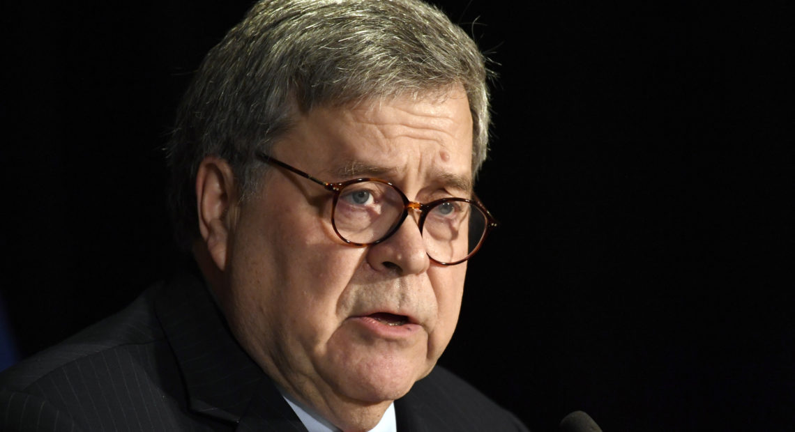 President Trump has congratulated Attorney General William Barr for "taking charge" of the Roger Stone case. Susan Walsh/AP