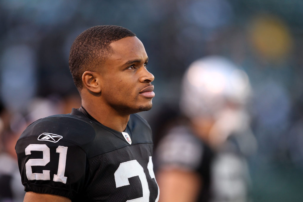 "I'm a student first in everything that I do," says Nnamdi Asomugha. "So it's always about: How can I get the edge mentally?" Asomugha, shown above on the sidelines of an Oakland Raiders game in November 2010, is now making his Broadway debut. Ezra Shaw/Getty Images