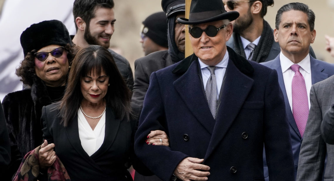 Roger Stone, former adviser to President Trump, arrives at the E. Barrett Prettyman U.S. Courthouse on Thursday in Washington, D.C., with his wife, Nydia. CREDIT: Drew Angerer/Getty Images