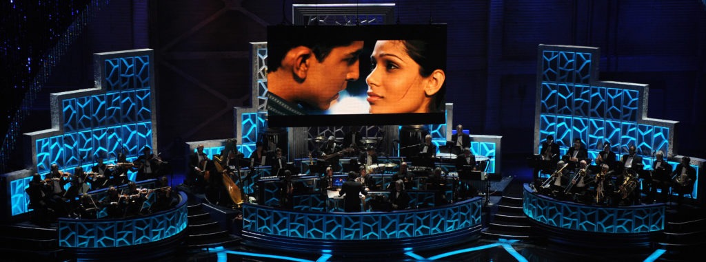 Musicians perform a song from Slumdog Millionaire during the 81st Annual Academy Awards on Feb. 22, 2009, in Hollywood, Calif. The film won 8 Oscars including Best Picture that year — and had box office returns to show for it. CREDIT: Gabriel Bouys/AFP via Getty Images