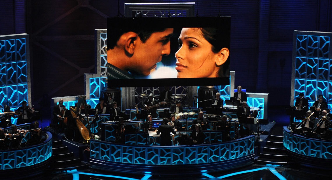 Musicians perform a song from Slumdog Millionaire during the 81st Annual Academy Awards on Feb. 22, 2009, in Hollywood, Calif. The film won 8 Oscars including Best Picture that year — and had box office returns to show for it. CREDIT: Gabriel Bouys/AFP via Getty Images