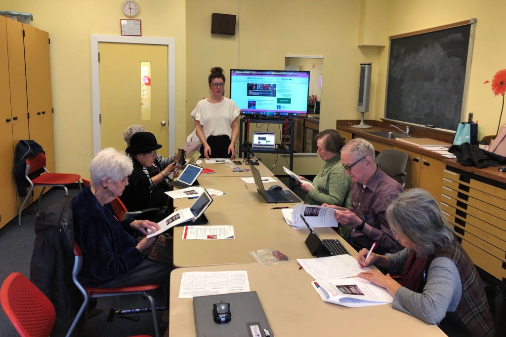 Bre Clark leads a workshop at the Schweinhaut Senior Center in Silver Spring, Md., called "How to Spot Fake News." CREDIT: Sam Gringlas/NPR