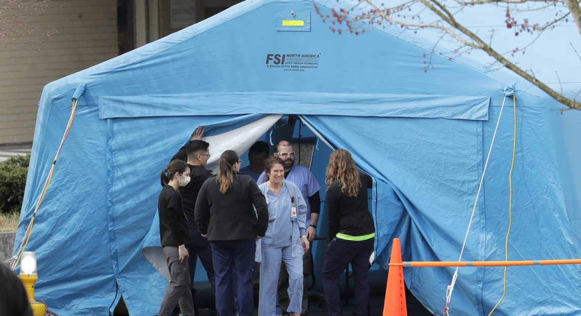 Nurses in an outdoor test testing area.