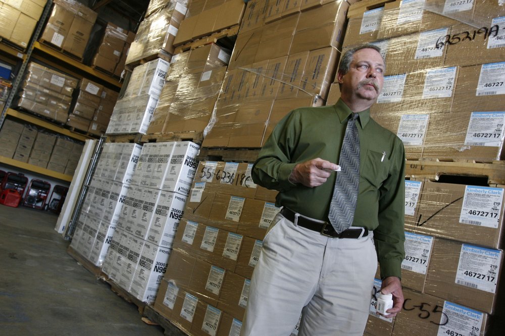 File photo. Don Wood, an official with the Strategic National Stockpile, awaits another truck load of medications in Salt Lake City, Utah during a swine flu outbreak from the H1N1 virus in 2009. The pandemic that year prompted the largest use to date of the stockpile, which was created in 1999. It has never confronted anything on the scale of the current COVID-19 pandemic. CREDIT: Francisco Kjolseth/AP