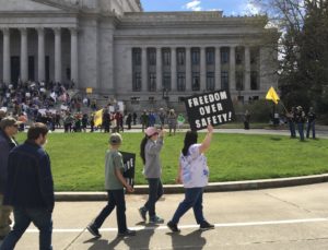 Protesters rally against social-distancing measures at the Washington state Capitol on April 19, 2020. CREDIT: Will James / KNKX