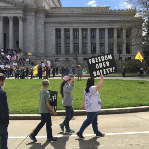Protesters rally against social-distancing measures at the Washington state Capitol on April 19, 2020. CREDIT: Will James / KNKX