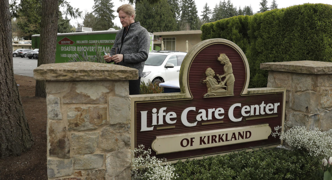 Tim Killian, a spokesman for Life Care Center in Kirkland, Wash., prepares to give a daily briefing to reporters on Wednesday. CREDIT: Ted S. Warren/AP
