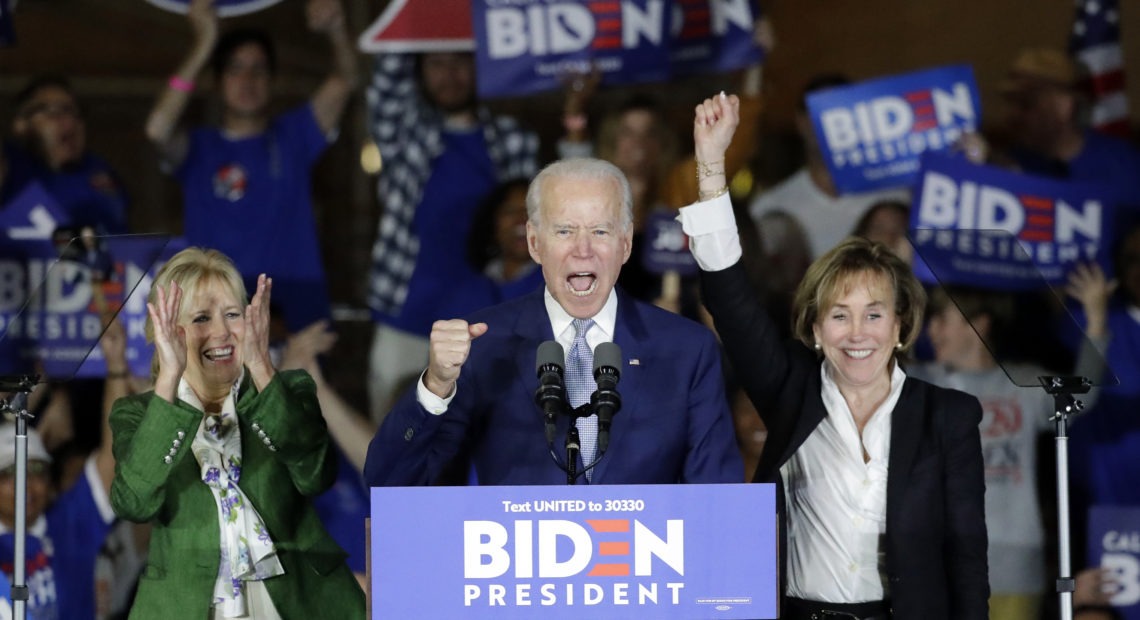 Joe Biden speaks at a campaign rally in Los Angeles with his wife Jill and his sister Valerie. The former vice president rode a wave of momentum that may have catapulted him back into front-runner status. Chris Carlson/AP