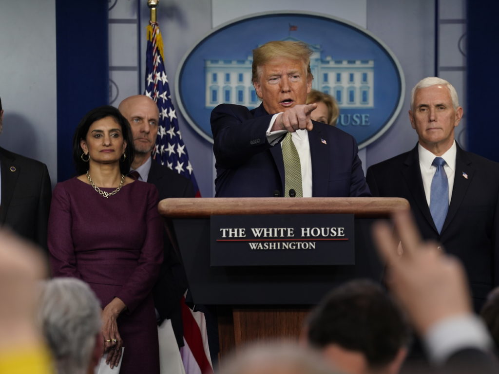 President Donald Trump speaks Tuesday during a press briefing with the coronavirus task force at the White House. Evan Vucci/AP