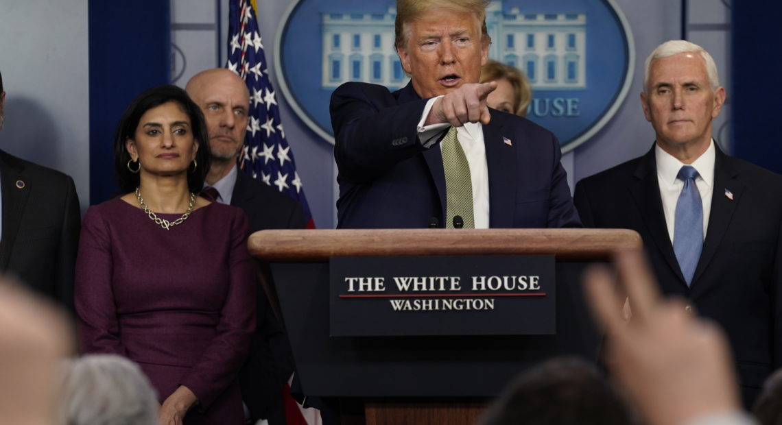 President Donald Trump speaks Tuesday during a press briefing with the coronavirus task force at the White House. Evan Vucci/AP