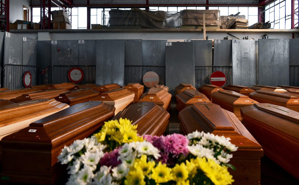 Coffins of deceased people stored in a warehouse near Bergamo — a city at the heart of Italy's coronavirus crisis — before being transported to another region for cremation. CREDIT: Piero Cruciatti/AFP via Getty Images