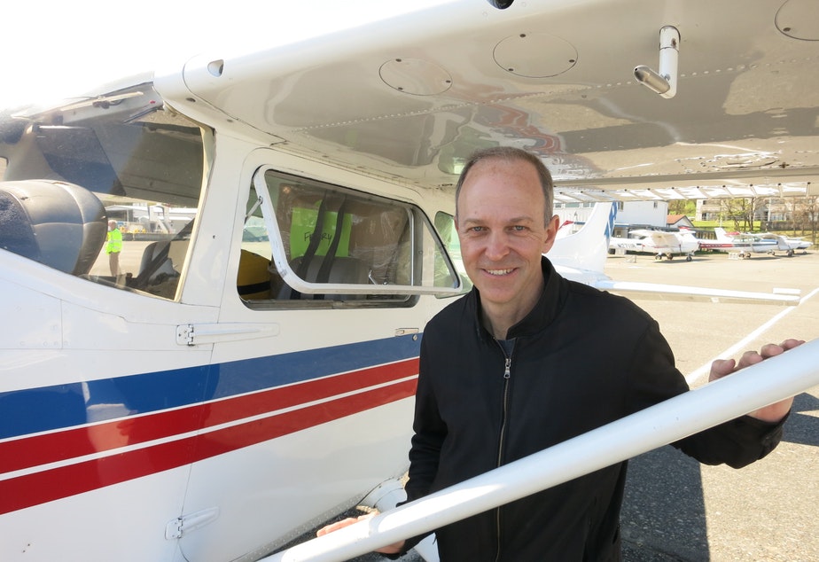 Boeing test pilot, Troy Larson, poses for a photo before flying boxes of surgical masks to rural hospitals in northeastern Washington. CREDIT: Anna Boiko-Weyrauch/KUOW