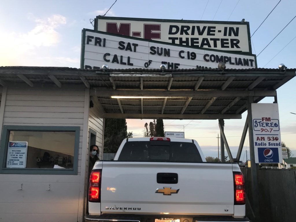 Cars lined up to get into the Milton-Freewater Drive-IN ahead of the opening weekend show, with plenty of social distancing measures in place, including only one person allowed in the bathroom at a time, with it being immediately cleaned by an employee. CREDIT: Courtney Flatt/NWPB