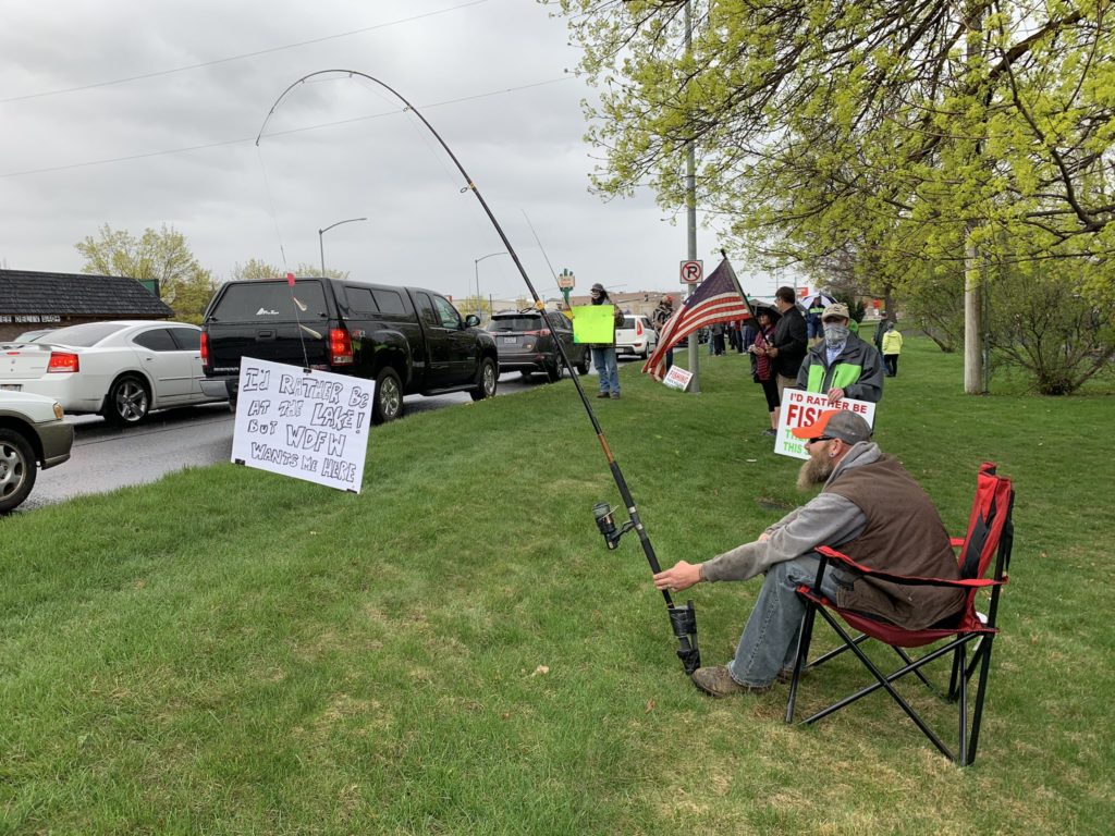 Demonstrators in Spokane's Franklin Park April 22 said they wanted to fish, saying it's one of the most socially distant and isolating activities possible. CREDIT: Nick Deshais/N3