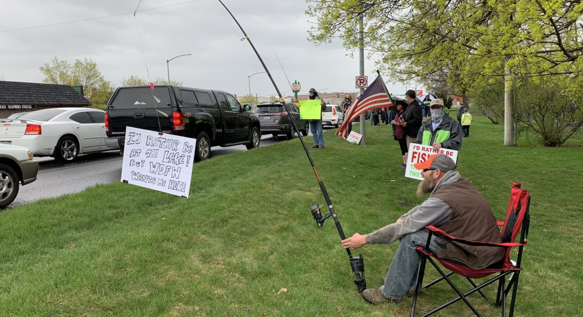 Demonstrators in Spokane's Franklin Park April 22 said they wanted to fish, saying it's one of the most socially distant and isolating activities possible. CREDIT: Nick Deshais/N3