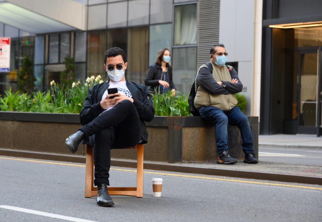 New Yorkers on Manhattan's Park Avenue cover their faces last week. Noam Galai/Getty Images