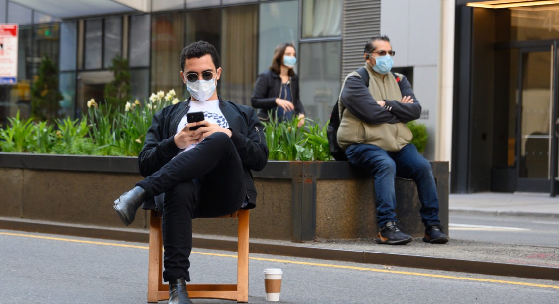 People wearing masks. Noam Galai/Getty Images