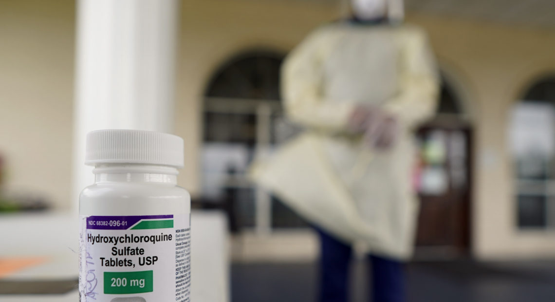 A bottle of hydroxycloroquine sits on a table outside the entrance to The Resort at Texas City nursing home, where Robin Armstrong, a doctor and the home's medical director, is giving the drug to residents CREDIT: David J. Phillip/AP