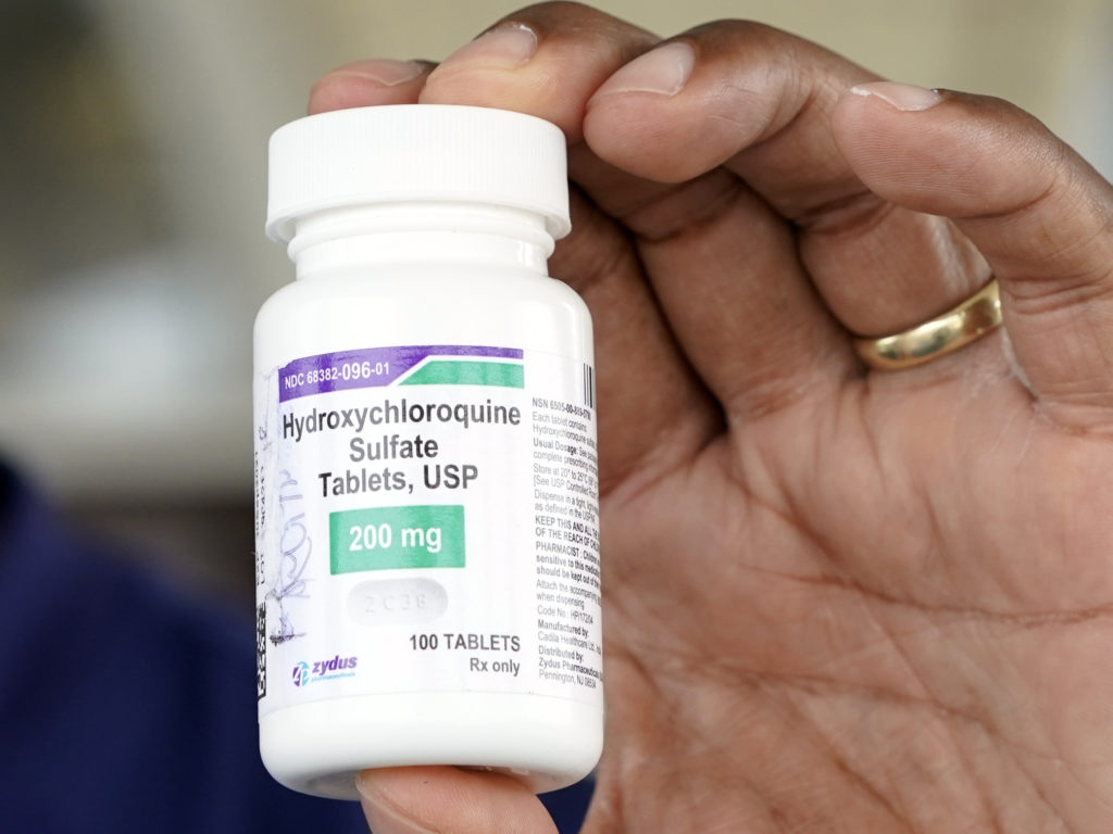 A bottle of hydroxychloroquine is seen outside a nursing home in Texas City, Texas, this month. CREDIT: David J. Phillip/AP