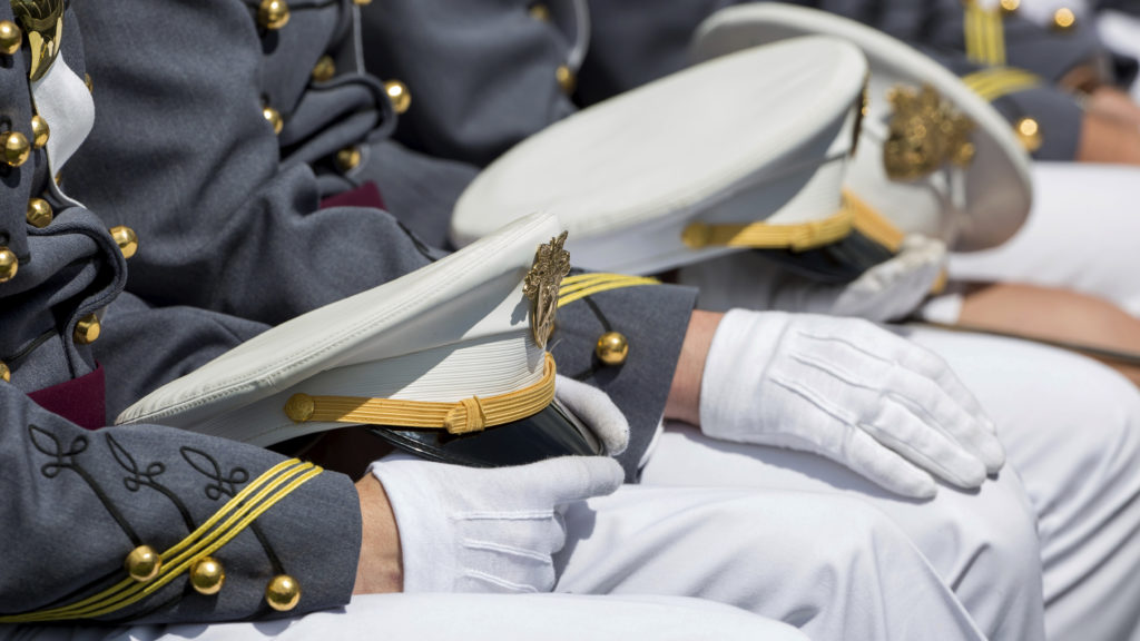 At last year's commencement, before the novel coronavirus, West Point cadets celebrated graduation in tight rows. Julius Motal/AP